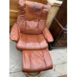 A STRESSLESS SWIVEL RECLINER AND STOOL