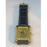 A SKELETON AUTOMATIC WRISTWATCH WITH RECTANGULAR FACE SEEN WORKING BUT NO WARRANTY