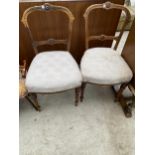 A PAIR OF VICTORIAN WALNUT PARLOUR CHAIRS