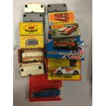 A COLLECTION OF BOXED AND UNBOXED MATCHBOX VEHICLES - ALL MODEL NUMBER 74 OF VARIOUS ERAS AND