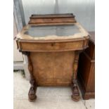 A VICTORIAN WALNUT DAVENPORT WITH RAISED GALLERY BACK, 21.5" WIDE