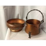 AN ARTS AND CRAFTS STYLE COPPER BOWL AND PLANTER WITH HANDLE