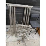 A QUANTITY OF METAL SHOP DISPLAY STANDS AND A STOOL