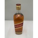 A LITRE BOTTLE OF JOHNNIE WALKER RED LABEL OLD SCOTCH WHISKY