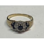 A 9 CARAT GOLD RING WITH SAPPHIRES SIZE Q/R IN A PRESENTATION BOX