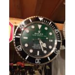 A ROLEX DEALERS WALL CLOCK