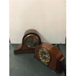 TWO VINTAGE MANTLE CLOCKS ONE BEING A NAPOLEONS HAT STYLE, THE OTHER HAS A PLAQUE FROM I C I DATED
