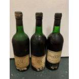 THREE BOTTLES OF HEDGES & BUTLER LTD 1963 VINTAGE PORT TO INCLUDE DOW AND FEUERHEERD