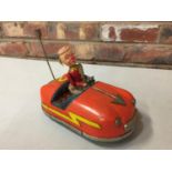 A RARE TINPLATE 1960'S DODGEM CAR WITH CLOWN DRIVER BY ALPS JAPAN