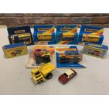 A COLLECTION OF BOXED AND UNBOXED MATCHBOX VEHICLES - ALL MODEL NUMBER 26 OF VARIOUS ERAS AND
