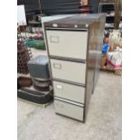 A METAL FOUR DRAWER 'UNIVERSAL' FILING CABINET