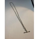 A MARKED SILVER BELCHER CHAIN WITH A T BAR PENDANT