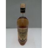 A 1 LITRE BOTTLE OF GRANTS FINEST SCOTCH WHISKY SUPERIOR STRENGTH 100% US PROOF