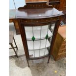AN EDWARDIAN GLAZED AND LEADED DISPLAY CABINET ON TAPERED LEGS, 23" WIDE