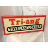 AN ILLUMINATED TRI-ANG TOYS LAST LONGER SIGN