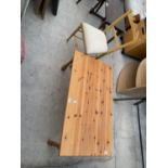 A MODERN PINE COFFEE TABLE AND A BEDROOM CHAIR