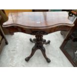 A VICTORIAN WALNUT SERPENTINE FOLD-OVER CARD TABLE ON QUATREFOIL BASE, 35" WIDE