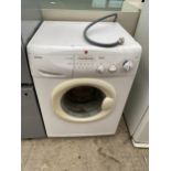 A WHITE HOOVER WASHING MACHINE