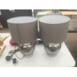 A PAIR OF GLASS TABLE LAMPS WITH GREY SHADES