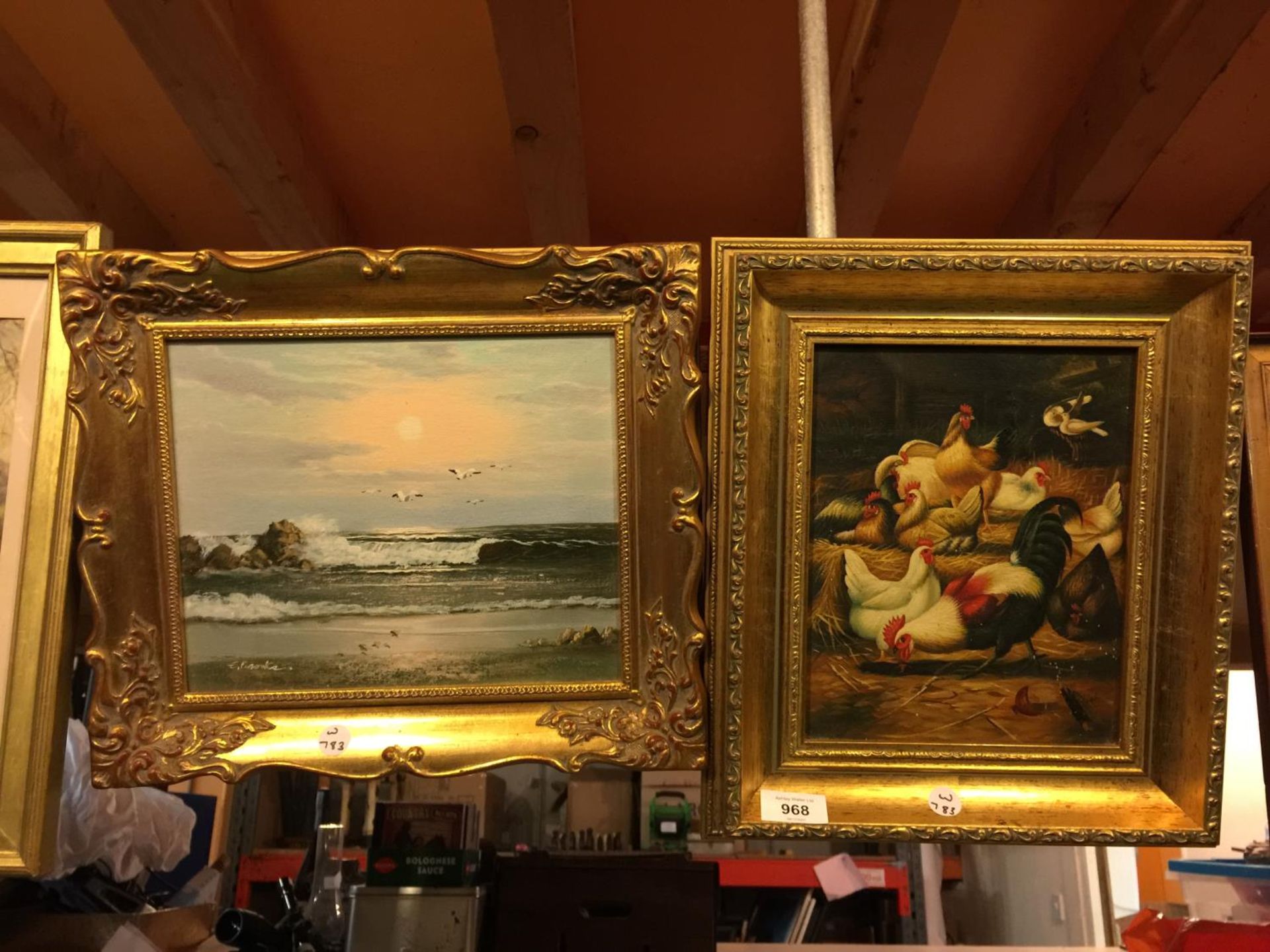TWO GILT FRAMED OIL ON CANVAS PAINTINGS OF HENS AND A SEA SCAPE