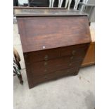 AN EDWARDIAN MAHOGANY BUREAU, 39" WIDE