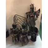 A KNIGHT WINE RACK, TW0 KNIGHT BOTTLE TOPPERS AND A KNIGHT BOTTLE STOPPER