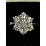 AN 18 CARAT WHITE GOLD FLOWER DESIGN CLUSTER RING WITH 2 CARATS OF DIAMONDS IN A PRESENTATION BOX