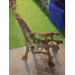 A PAIR OF CAST IRON ENDS FOR A CHILDRENS BENCH