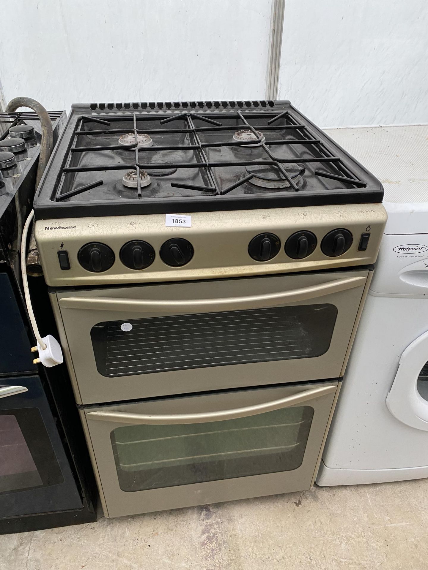 A GREY NEWHOME FREESTANDING OVEN AND HOB