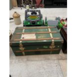 A VINTAGE GREEN PAINTED WOODEN STORAGE CHEST WITH WOODEN BANDING