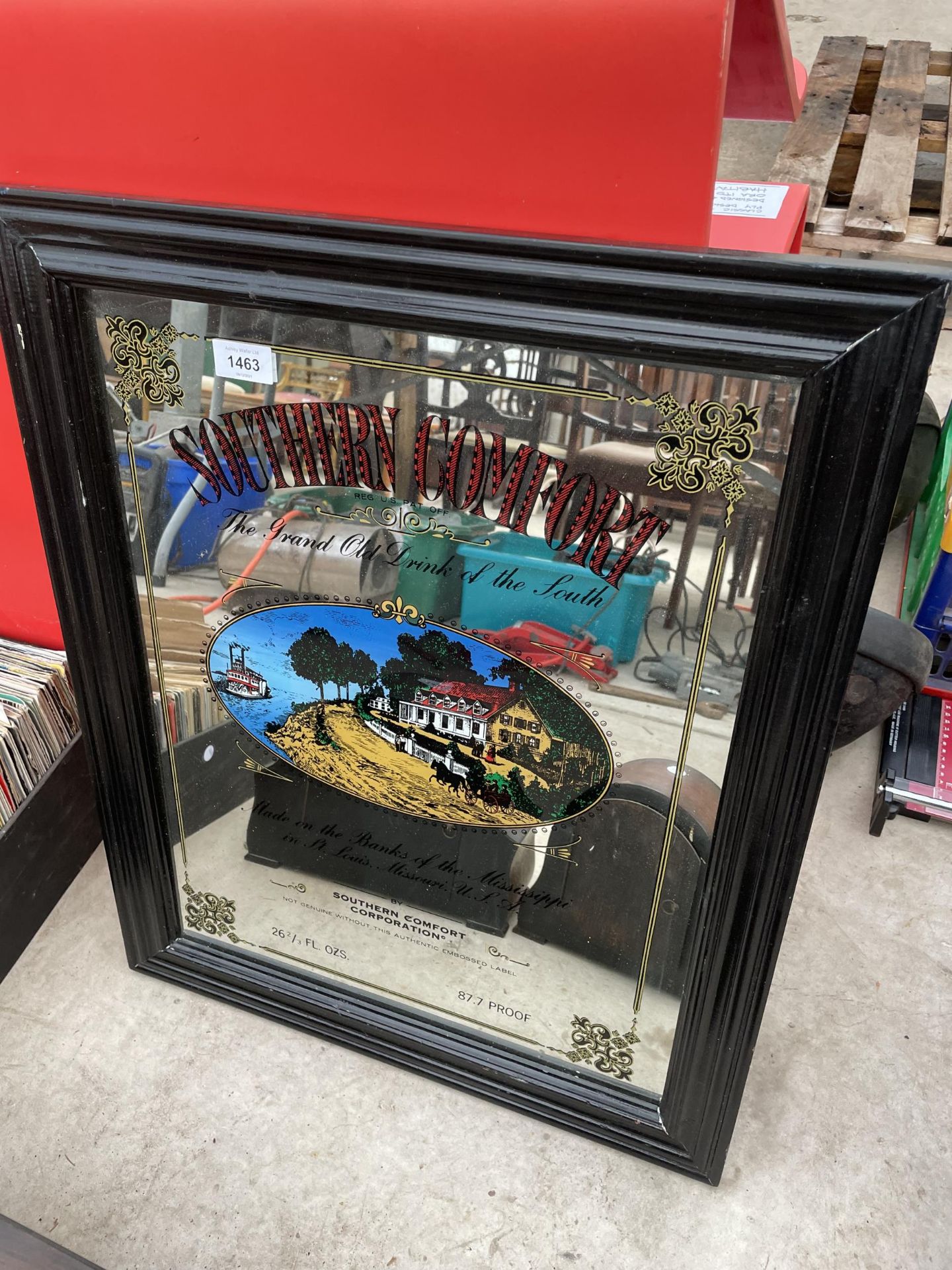 A WOODEN FRAMED SOUTHERN COMFORT ADVERTISING MIRROR