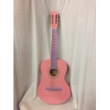 A PINK READY ACE ACCOUSTIC GUITAR