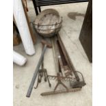 AN ASSORTMENT OF GARDEN TOOLS TO INCLUDE RAKES, A SAW AND A HANGING BASKET ETC