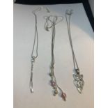 THREE SILVER NECKLACES WITH PENDANTS