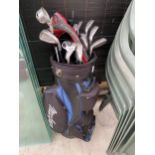 A GOLF BAG AND AN ASSORTMENT OF GOLF CLUBS