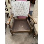 A MID 20TH CENTURY LOW CHILDS FIRESIDE CHAIR