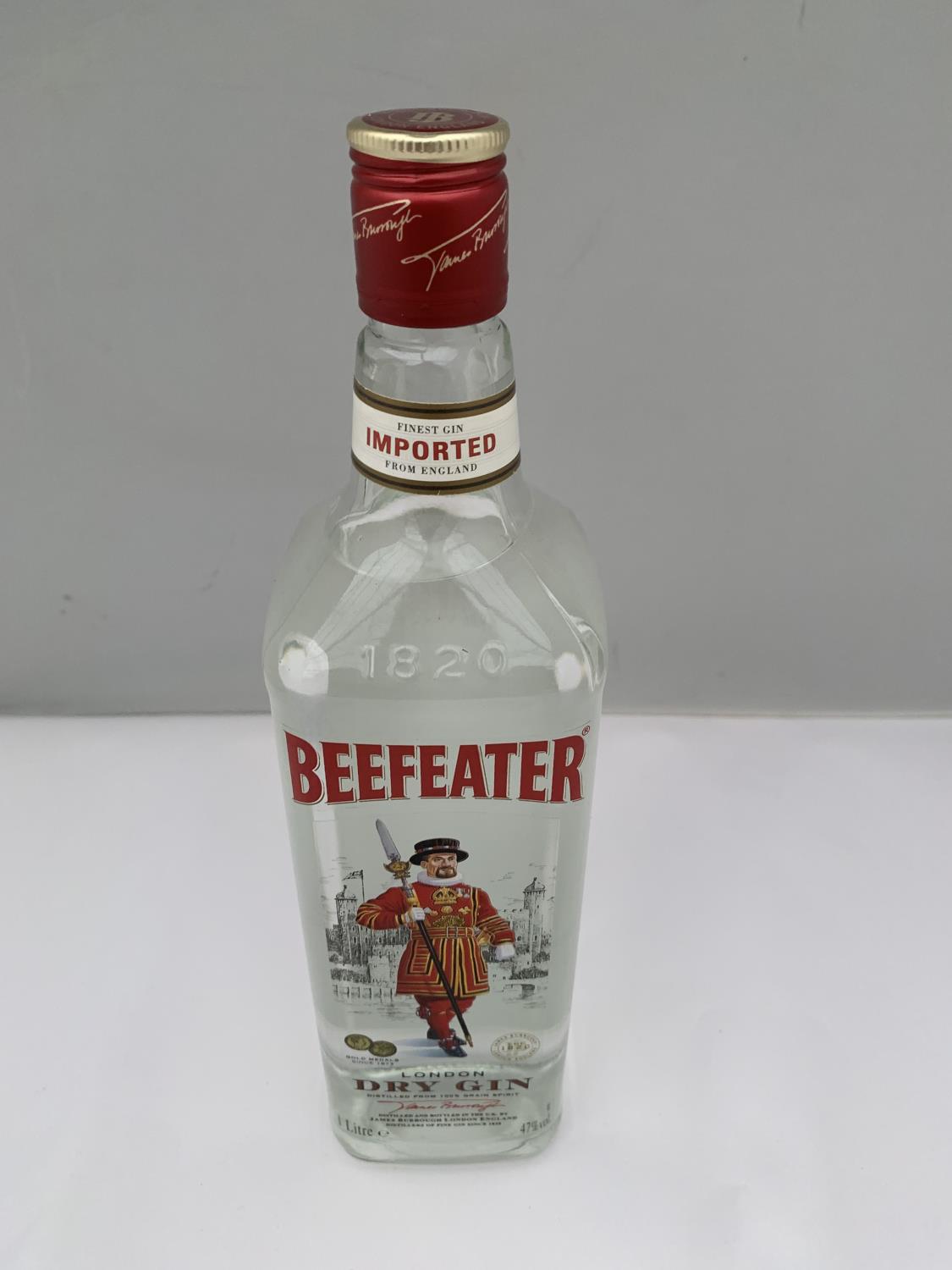 A 1 LITRE BEEFEATER LONDON DRY GIN 47% VOL