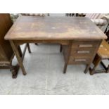 AN OAK ABBESS SINGLE PEDESTAL DESK, 42 X 24"