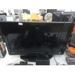 A 32" TECHNIKA TELEVISION WITH REMOTE CONTROL