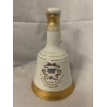 A BELL'S SCOTCH WHISKY, PERTH SCOTLAND, 40% VOL 50CL IN A COLLECTABLE WADE COMMEMORATIVE PORCELAIN