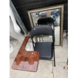 A FOLDING CHAIR WITH TRAY AND A WALL MIRROR