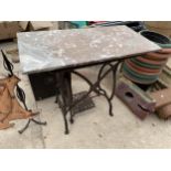 A MARBLE TOPPED OCCASIONAL TABLE WITH TREDDLE BASE