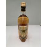 A 1 LITRE BOTTLE OF GRANTS FINEST SCOTCH WHISKY SUPERIOR STRENGTH 100% US PROOF