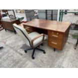 A TEAK DESK AND OFFICE CHAIR