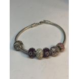 A MARKED SILVER PANDORA STYLE BRACELET WITH SIX COLOURED STONE CHARMS