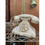 A VINTAGE STYLE CREAM PUSH BUTTON TELEPHONE WITH SLIDE OUT CARD TRAY