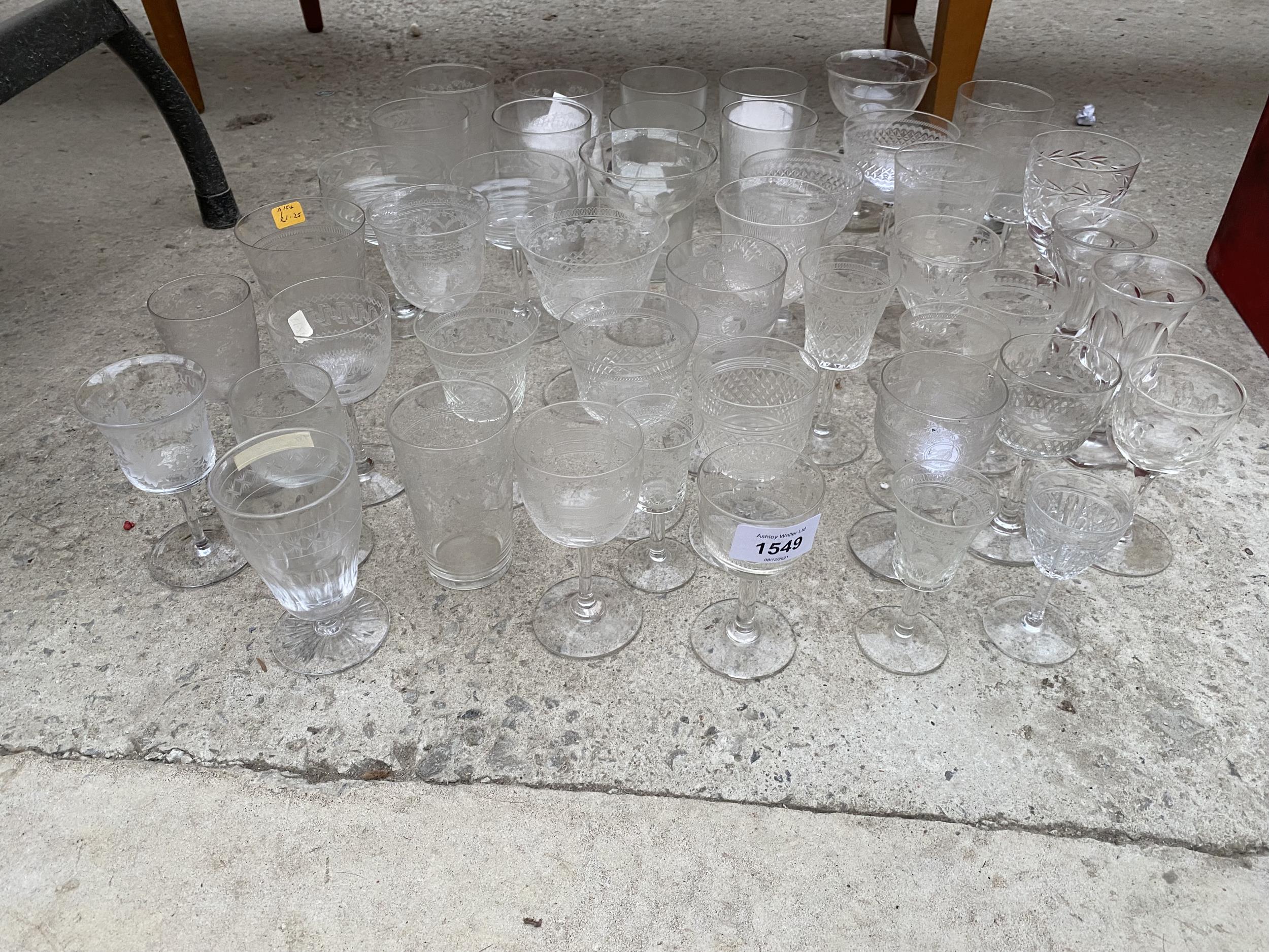 AN ASSORTMENT OF GLASS WARE TO INCLUDE SHERRY GLASSES, TUMBLERS AND WINE GLASSES ETC