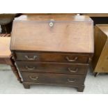 A GEORGE III MAHOGANY BUREAU, 36" WIDE