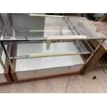 A WOODEN AND GLASS SHOP DISPLAY UNIT WITH LOWER DRAWER