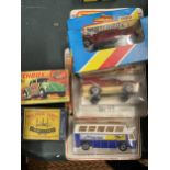 FOUR MATCHBOX DIECAST CARS, TO INCLUDE DRAGON WHEELS, CARS, LUFTHANSA BUS AND ROAD SIGN ACCESORIES